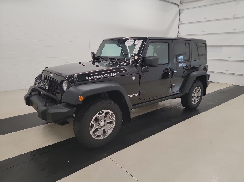 Used 2014 Jeep Wrangler Unlimited Rubicon with VIN 1C4HJWFGXEL149934 for sale in Monticello, Minnesota