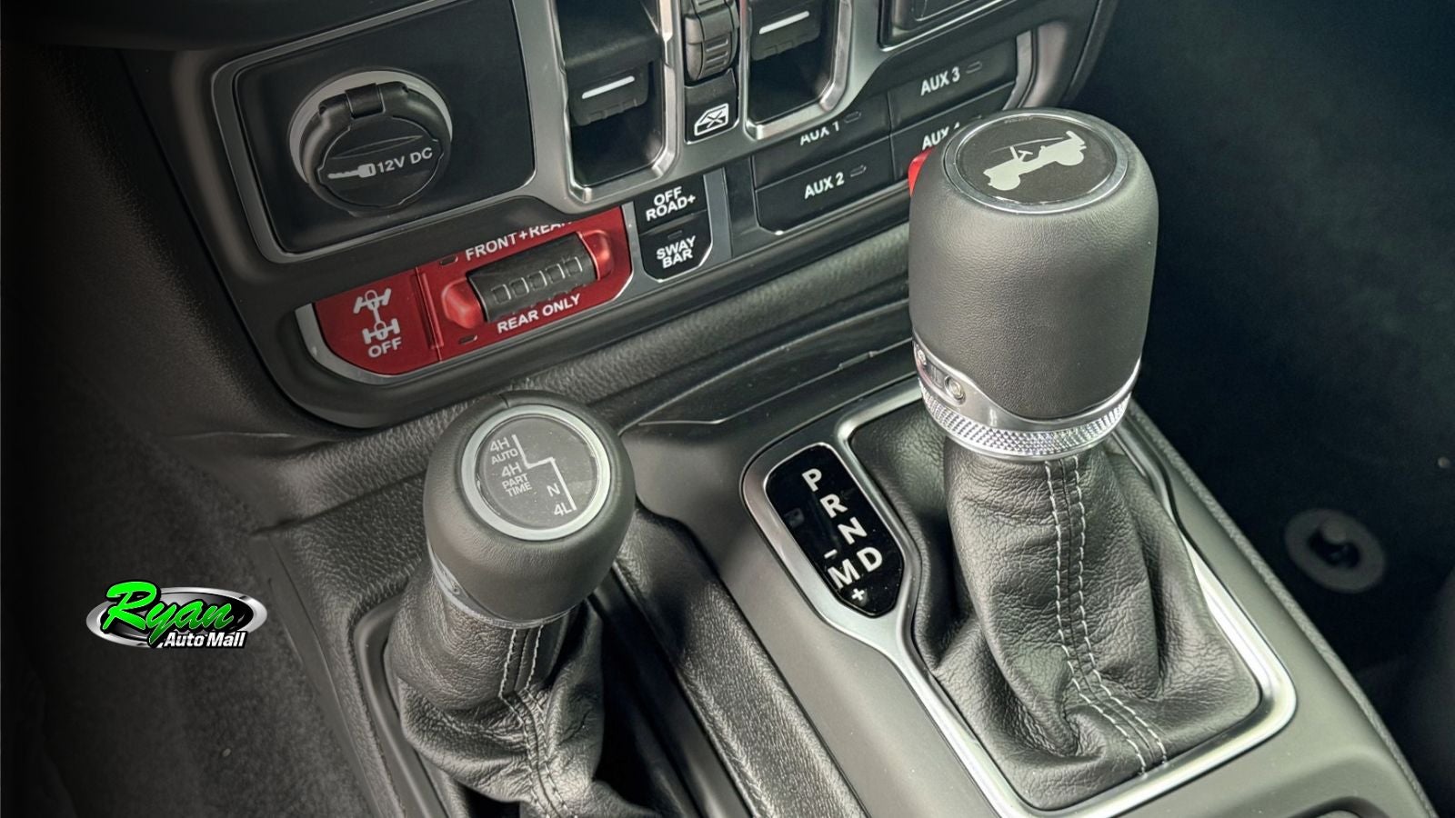Four-wheel-drive selector and off-road controls in a 2026 Jeep Wrangler MOAB 392.