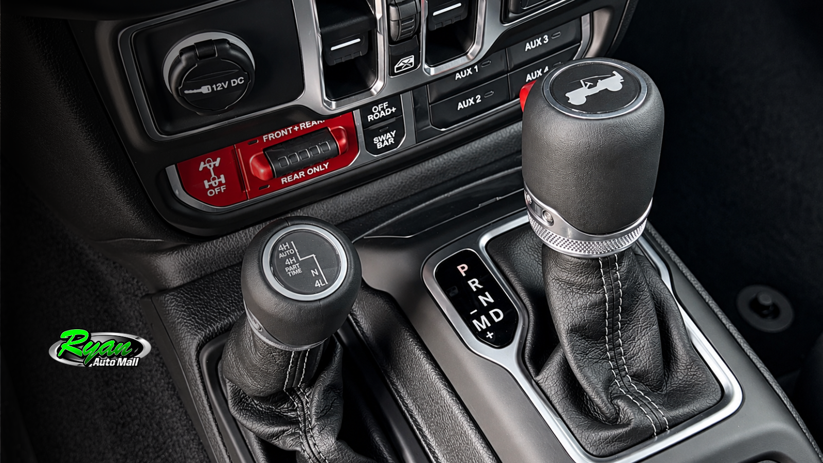 Four-wheel-drive selector and off-road controls in a 2026 Jeep Wrangler MOAB 392.